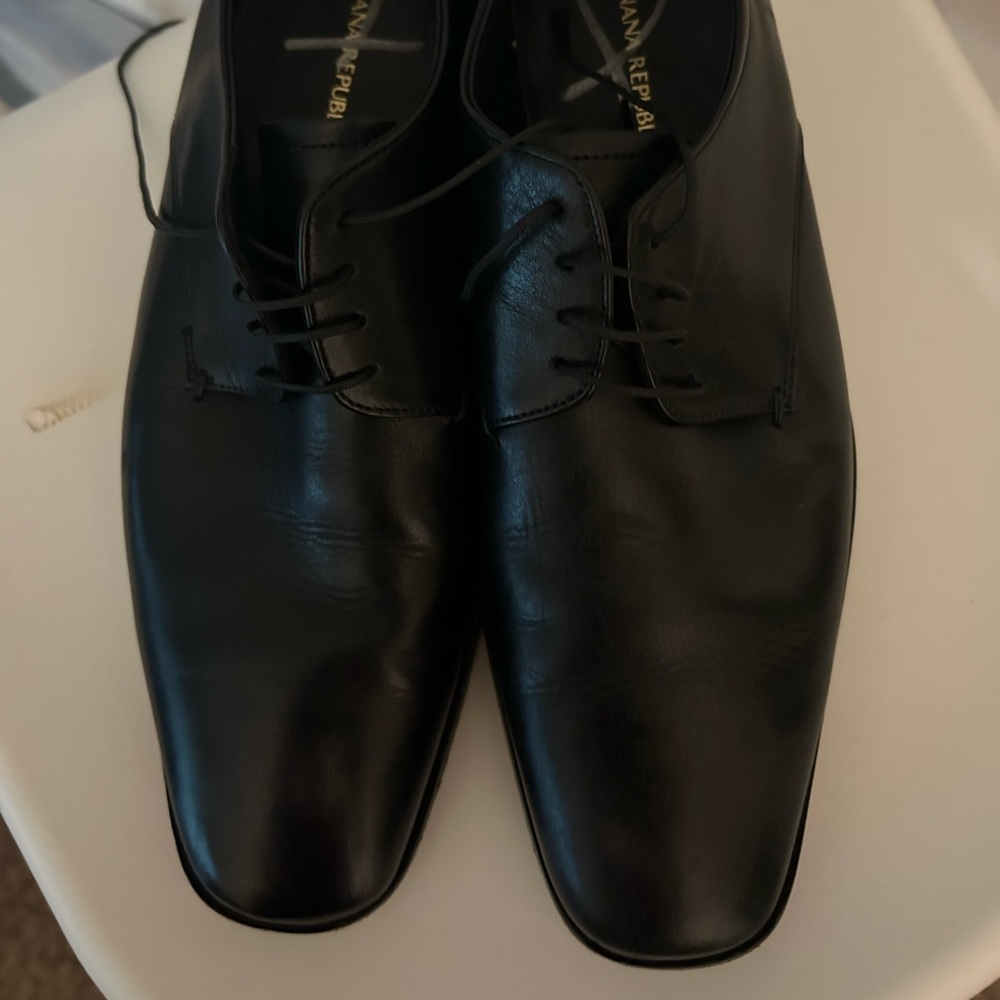 Men’s black lace up shoes. Worn a couple of times but in good condition